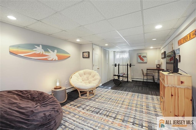 sitting room featuring recessed lighting, baseboards, a paneled ceiling, and baseboard heating