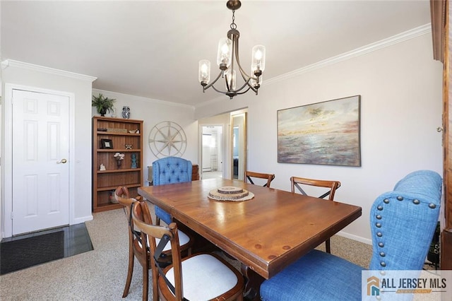 carpeted dining area with a chandelier, baseboards, and crown molding