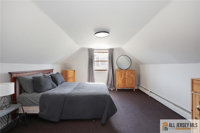 bedroom with a baseboard radiator, vaulted ceiling, and carpet flooring