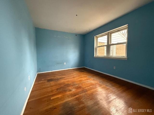 172 Evergreen Rd Unit 20B, Edison, NJ 08837 - unfurnished room featuring wood-type flooring and baseboards