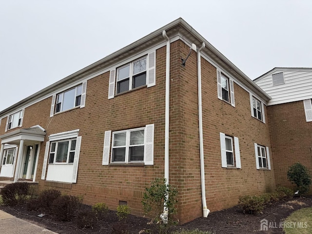 172 Evergreen Rd Unit 20B, Edison, NJ 08837 - view of side of property with crawl space and brick siding