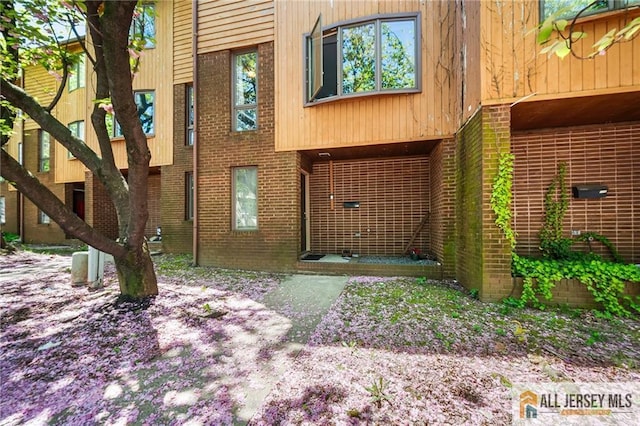 156 George St, New Brunswick, NJ 08901 - doorway to property with brick siding