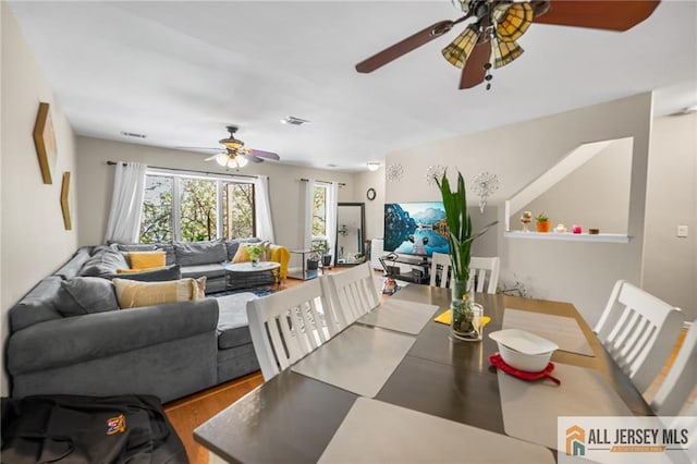156 George St, New Brunswick, NJ 08901 - dining space featuring a ceiling fan and wood finished floors