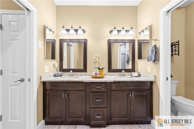24 Birmingham Ln, Monroe, NJ 08831 - bathroom featuring double vanity and toilet