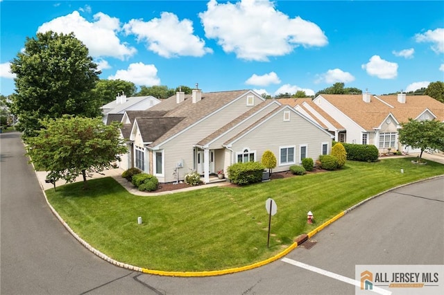 24 Birmingham Ln, Monroe, NJ 08831 - view of front of home with a front yard