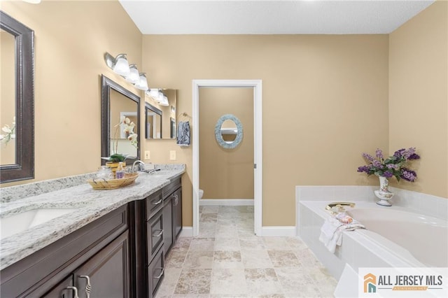 24 Birmingham Ln, Monroe, NJ 08831 - full bathroom featuring double vanity and a bath