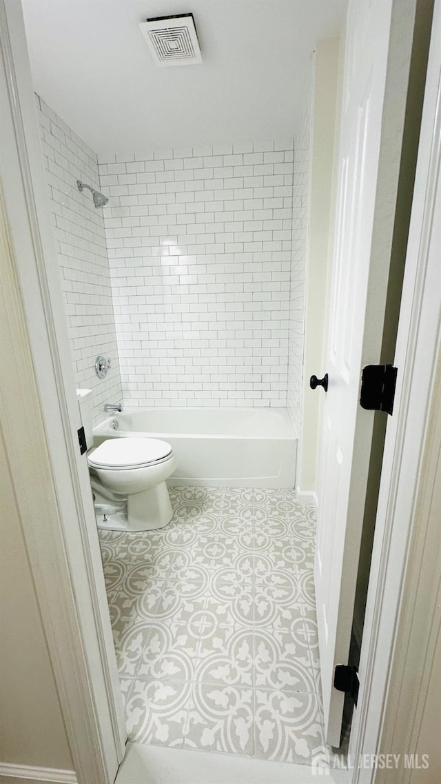 7 Harper Rd, South Brunswick, NJ 08852 - bathroom featuring toilet,  shower combination, and tile patterned floors