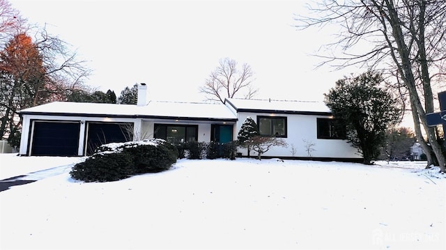 7 Harper Rd, South Brunswick, NJ 08852 - single story home with a garage, a chimney, and stucco siding