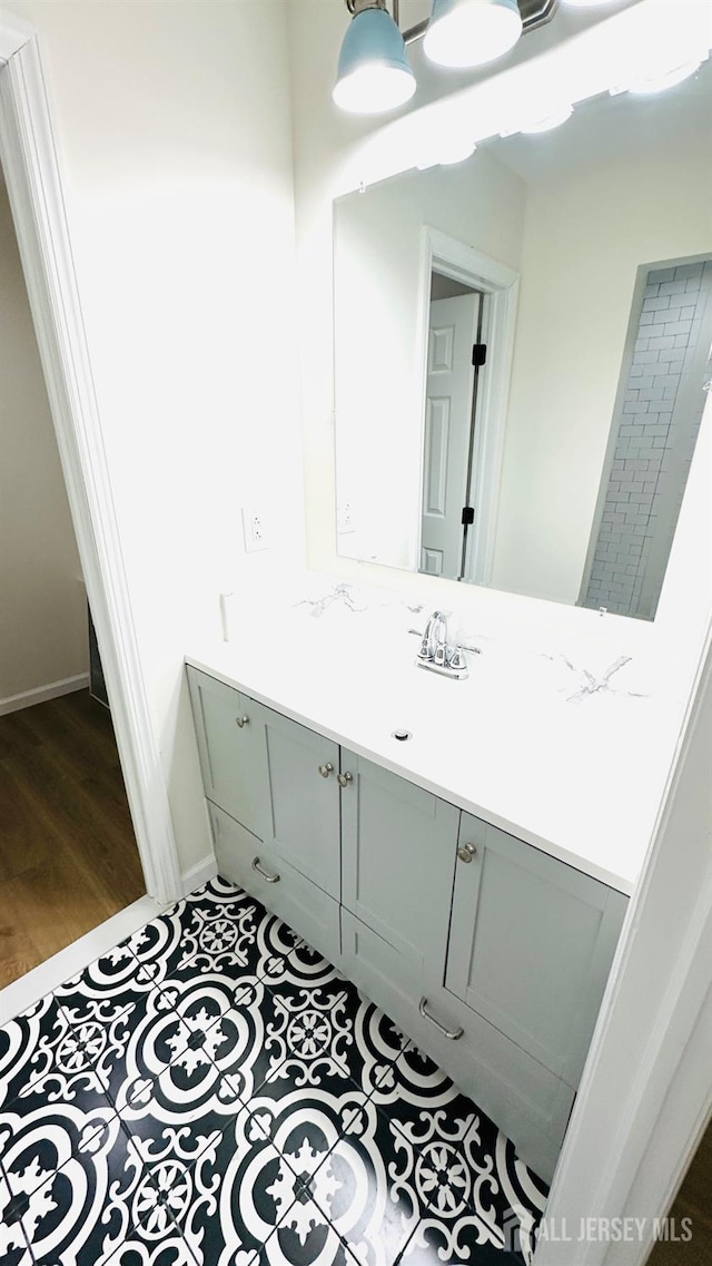 7 Harper Rd, South Brunswick, NJ 08852 - bathroom with vanity and tile patterned flooring