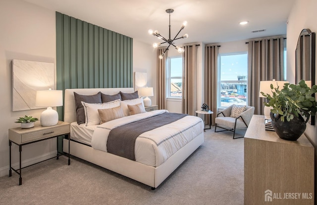 bedroom with an inviting chandelier, recessed lighting, carpet, and visible vents