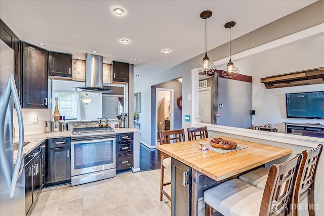 55 Renaissance Ln, New Brunswick, NJ 08901 - kitchen featuring appliances with stainless steel finishes, wall chimney range hood, pendant lighting, recessed lighting, and decorative backsplash
