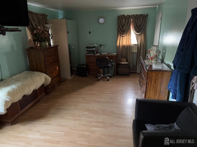 bedroom with light wood-style floors