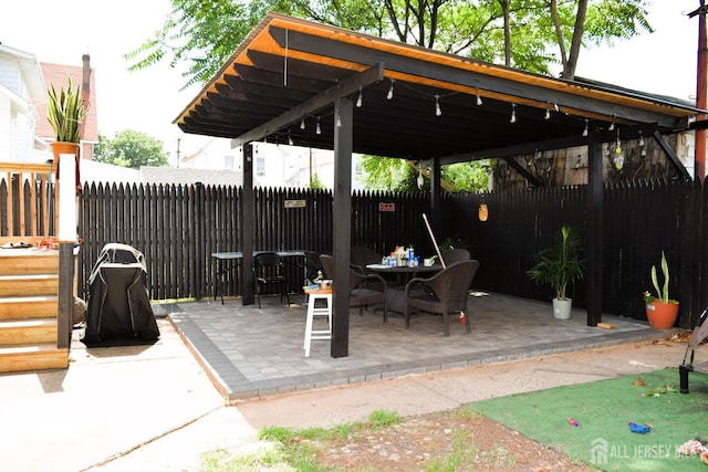 view of patio / terrace with fence