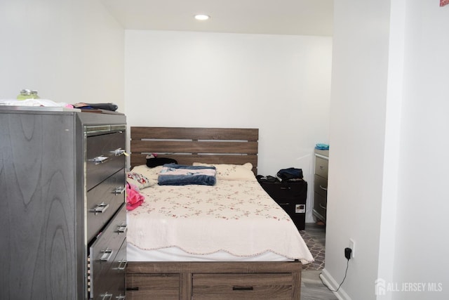 bedroom featuring recessed lighting