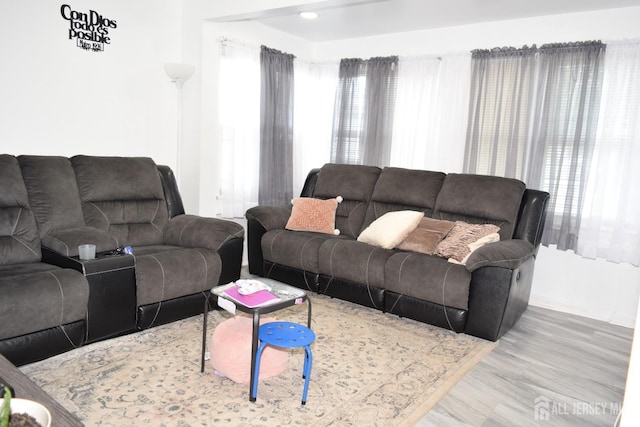 living area featuring light wood-style flooring