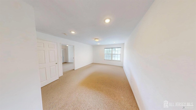 28 Elm St, East Brunswick, NJ 08816 - spare room with recessed lighting and light carpet