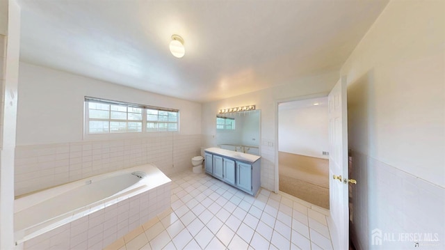 28 Elm St, East Brunswick, NJ 08816 - full bath with vanity, a garden tub, tile patterned floors, and tile walls