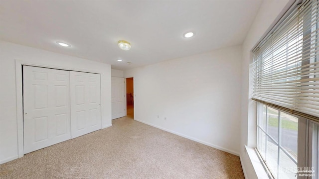 28 Elm St, East Brunswick, NJ 08816 - unfurnished bedroom with light carpet, multiple windows, recessed lighting, and a closet