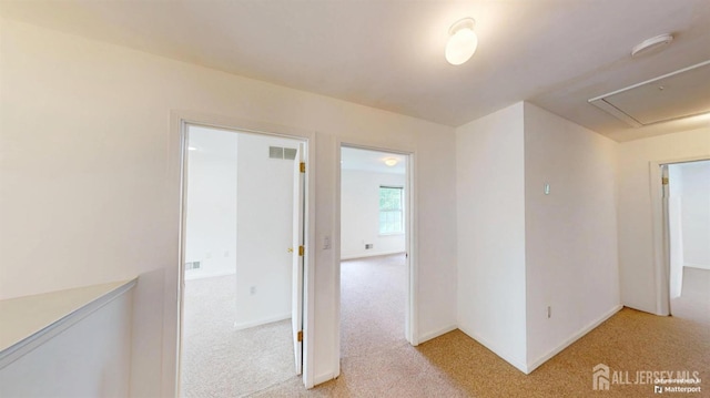 28 Elm St, East Brunswick, NJ 08816 - hall with light colored carpet and attic access
