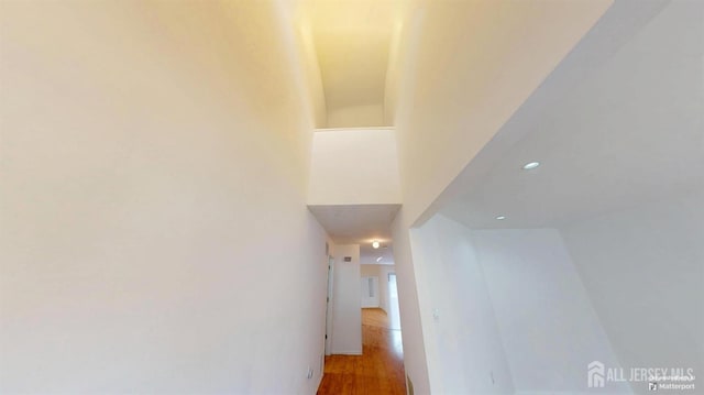 28 Elm St, East Brunswick, NJ 08816 - hallway with wood finished floors and recessed lighting