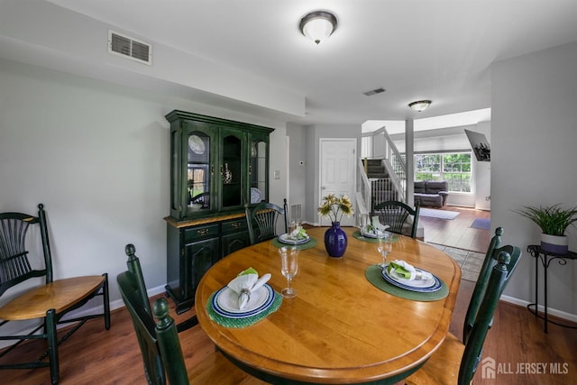 41 Haymarket Ct, East Windsor, NJ 08512 - dining space with wood finished floors and stairs