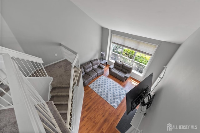41 Haymarket Ct, East Windsor, NJ 08512 - living room featuring wood finished floors and stairway