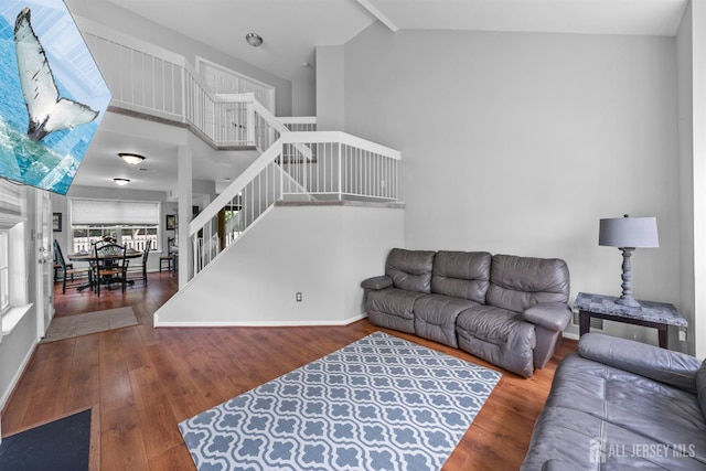 41 Haymarket Ct, East Windsor, NJ 08512 - living room with stairs, wood finished floors, and high vaulted ceiling