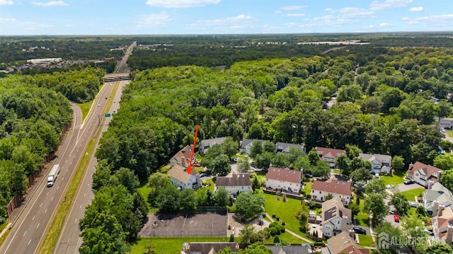 41 Haymarket Ct, East Windsor, NJ 08512 - aerial perspective of suburban area with a main thoroughfare and a forest
