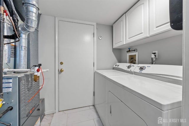 41 Haymarket Ct, East Windsor, NJ 08512 - laundry area featuring cabinet space, washing machine and clothes dryer, light marble finish flooring, and heating unit