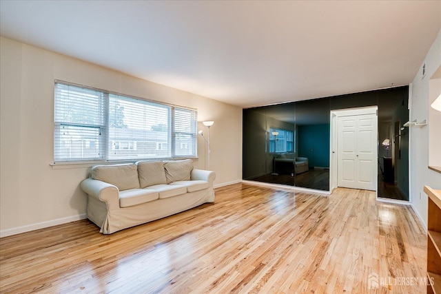 47 Judson St Unit 12B, Edison, NJ 08837 - living room featuring wood finished floors and baseboards