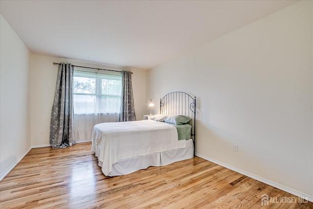 47 Judson St Unit 12B, Edison, NJ 08837 - bedroom with light wood finished floors and baseboards