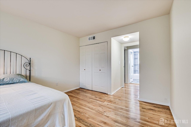 47 Judson St Unit 12B, Edison, NJ 08837 - bedroom featuring light wood finished floors, baseboards, and a closet