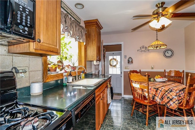 kitchen with sink, tasteful backsplash, ceiling fan, and black appliances