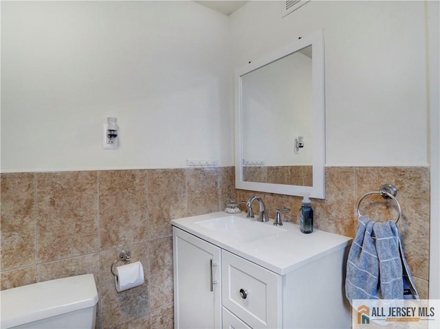 15 Leland Ave, South River, NJ 08882 - half bathroom featuring vanity and tile walls