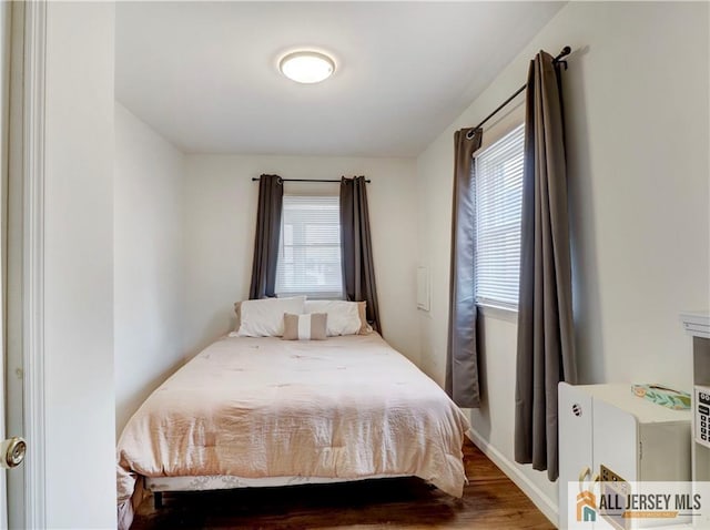 15 Leland Ave, South River, NJ 08882 - bedroom featuring multiple windows and wood finished floors