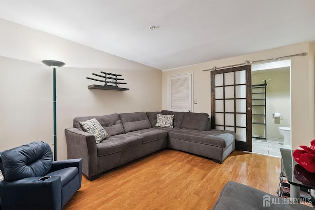 816 Harbortown Blvd Unit 816, Perth Amboy, NJ 08861 - living area with light wood-style floors and vaulted ceiling