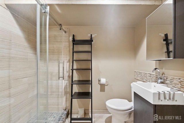 816 Harbortown Blvd Unit 816, Perth Amboy, NJ 08861 - bathroom featuring a shower stall, vanity, and backsplash