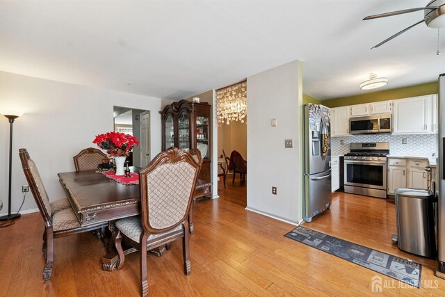 816 Harbortown Blvd Unit 816, Perth Amboy, NJ 08861 - dining room with a ceiling fan and light wood finished floors