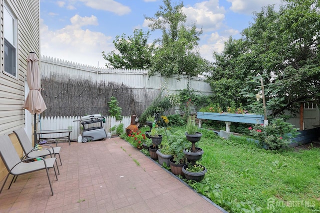 440 Bruck Ave, Perth Amboy, NJ 08861 - fenced backyard featuring a patio area