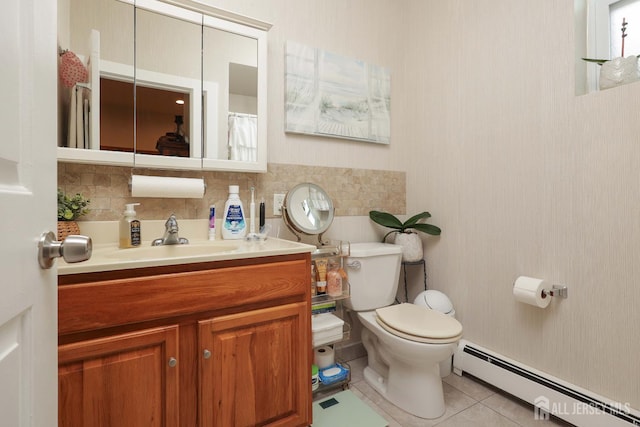 440 Bruck Ave, Perth Amboy, NJ 08861 - bathroom featuring a baseboard heating unit, tile patterned floors, vanity, and decorative backsplash