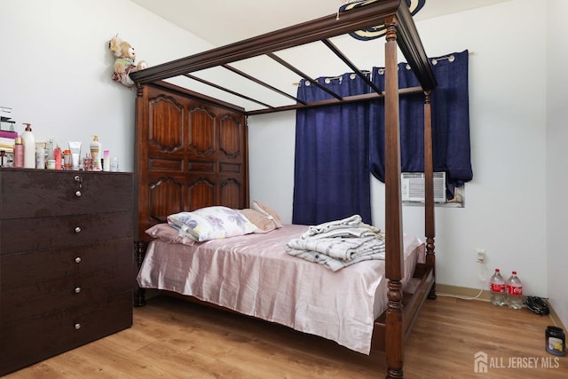 440 Bruck Ave, Perth Amboy, NJ 08861 - bedroom featuring wood finished floors and cooling unit