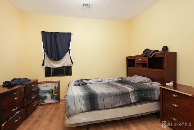 440 Bruck Ave, Perth Amboy, NJ 08861 - bedroom with light wood-type flooring and cooling unit