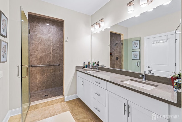 6 Traditions Pl, Monroe, NJ 08831 - full bathroom with double vanity, a stall shower, and tile patterned floors