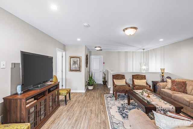 6 Traditions Pl, Monroe, NJ 08831 - living room featuring light wood-style flooring and recessed lighting