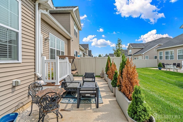 6 Traditions Pl, Monroe, NJ 08831 - fenced backyard with a patio area, a residential view, and an outdoor living space