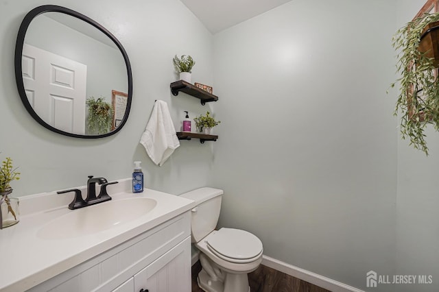 30 Forest Garden Dr, Old Bridge, NJ 07747 - half bath featuring vanity and wood finished floors