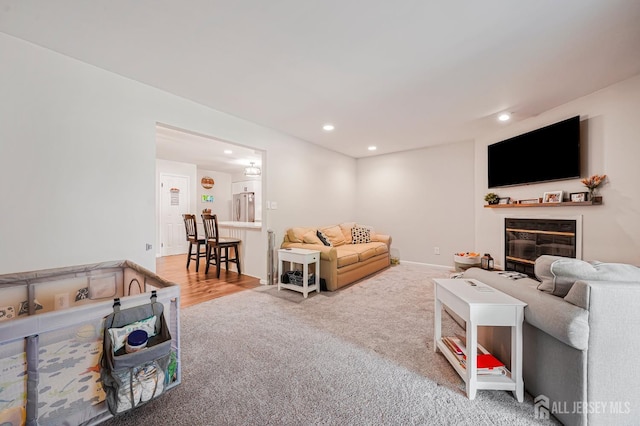 30 Forest Garden Dr, Old Bridge, NJ 07747 - carpeted living area featuring recessed lighting and a glass covered fireplace