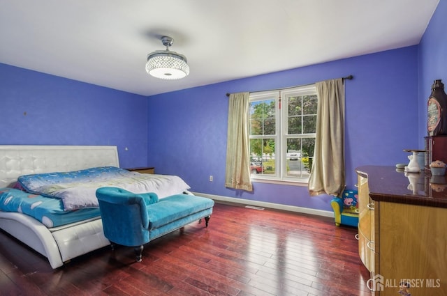 9 Merion Dr, Manalapan, NJ 07726 - bedroom with hardwood / wood-style floors and baseboards