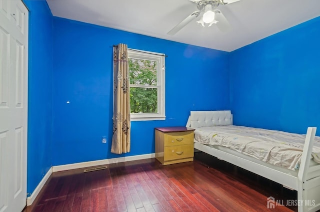 9 Merion Dr, Manalapan, NJ 07726 - bedroom featuring dark wood-type flooring, baseboards, and a ceiling fan