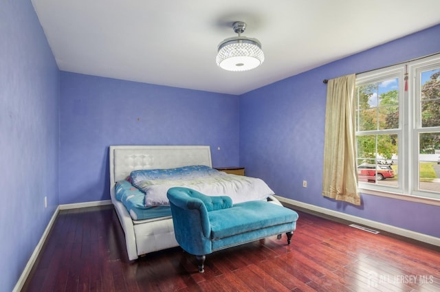 9 Merion Dr, Manalapan, NJ 07726 - bedroom with baseboards and hardwood / wood-style floors